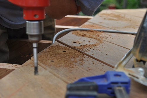 Predrilling holes for fasteners